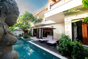 Villa Tepi Sungai a luxurious, under new management, 6 bedroom 620 sqm retreat featuring a stunning 15 meter pool and dedicated childrens room with 4 bunk beds newly renovated in Seminyak
